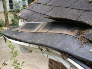 roof broken from bad gutter installation 