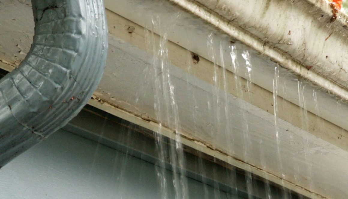 damaged gutters leaking water needing repair