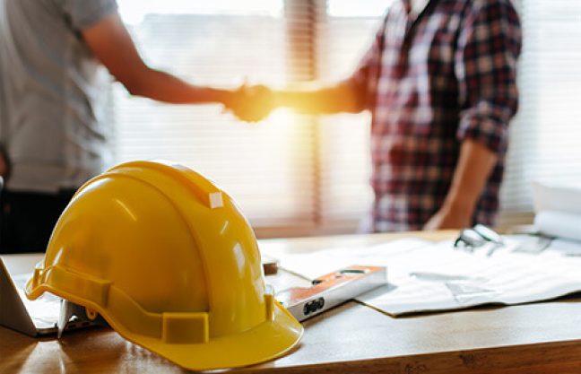 hire the right contractor shaking hands